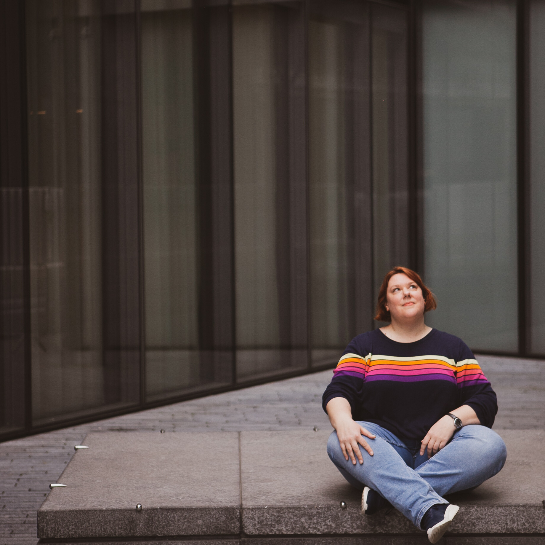 Cam Lamblin sat in front of an office building